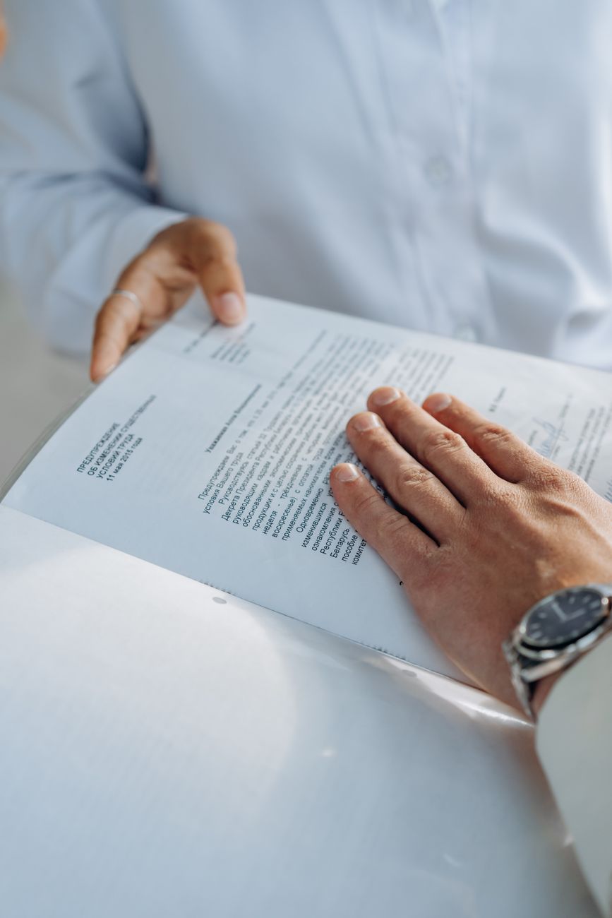 Corporate lawyer reviewing tech commercial agreements